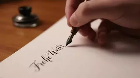 AI Video from prompt: video clip of a hand which notes the message  "F