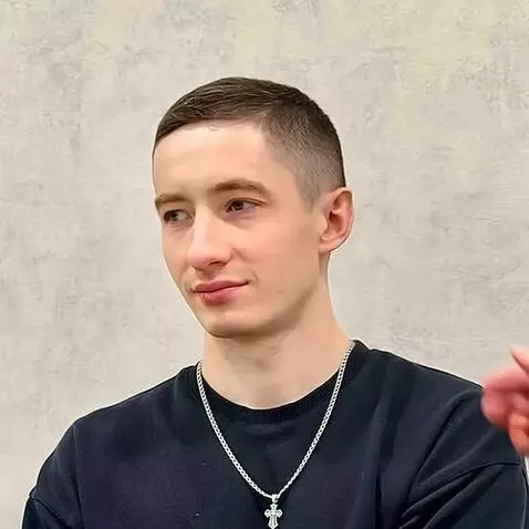 AI Video from prompt: This man is grabbed by the ear by Russian Presid