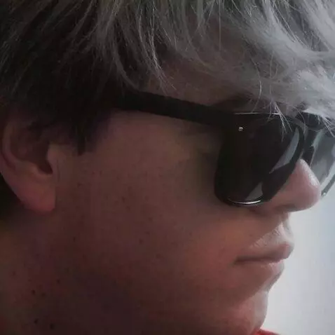 AI Video from prompt: This guy will smile after a few second