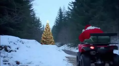 AI Video from prompt: Santa Claus rides through the forest on a red ut