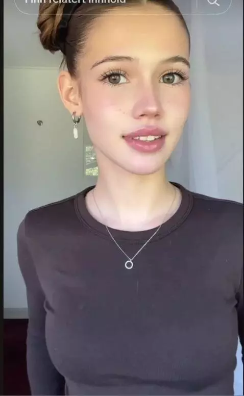 AI Video from prompt: undressing because its a hot summer day