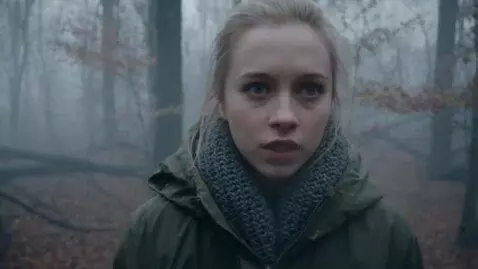 AI Video from prompt: A young Russian woman named Katya is filming an 