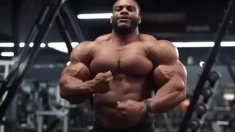 AI Video from prompt: gigantic hyper muscular male showing off