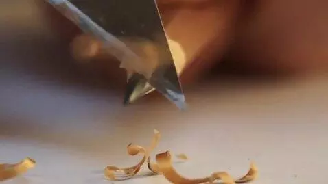 AI Video from prompt: Cinematic realism, extreme close-up. A sharpened