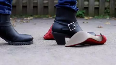 AI Video from prompt: Woman trample high heels