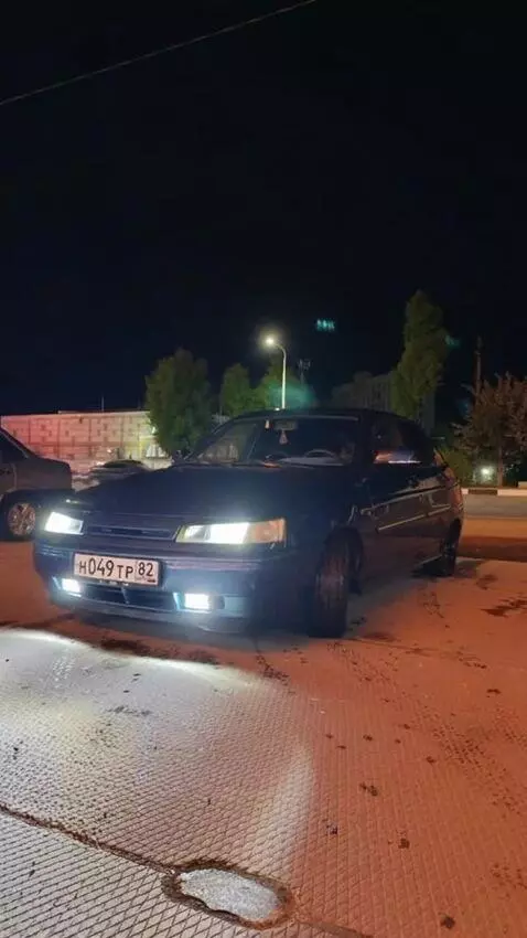 AI Video from prompt: Make it so that the car in the photo drives away