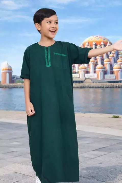 AI Video from prompt: a child promotes the robe he is wearing