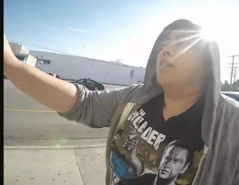 AI Video from prompt: She lifts her shirt and shows her stomach