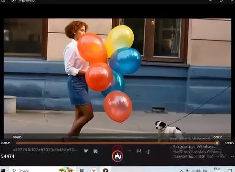 AI Video from prompt: A woman walks down the street with colorful, lar