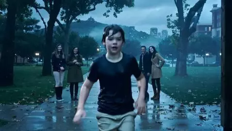 AI Video from prompt: The boy getting drenched in the rain didn't stop