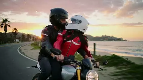 AI Video from prompt: a beautiful strong man and a woman with long bla