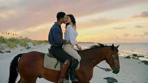 AI Video from prompt: A handsome, strong man and woman with long black