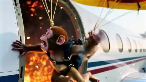 AI Video from prompt: A monkey stands in the open hatch of a burning a