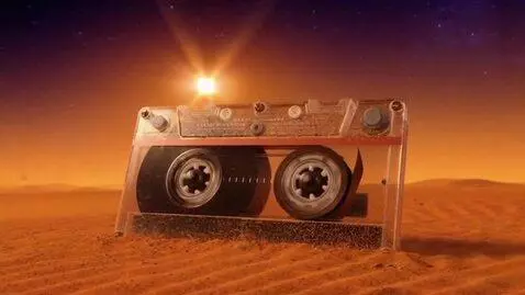 AI Video from prompt: Create a video of an audio cassette being rewoun