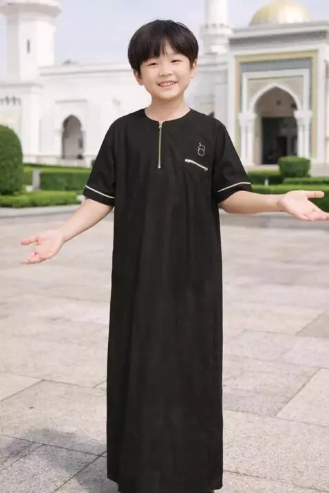 AI Video from prompt: a child appears happy promoting the robe he is w