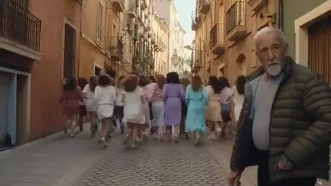 AI Video from prompt: "A large crowd of women of different ages runnin