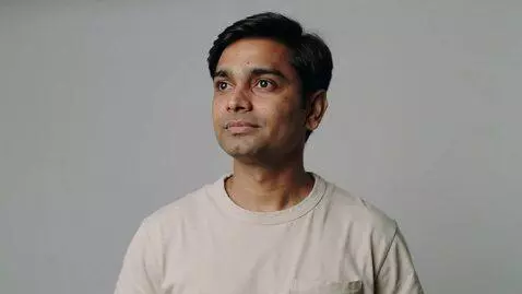 AI Video from prompt: A realistic Indian man in his 30s, medium brown 
