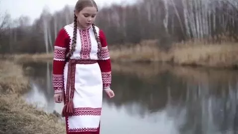 AI Video from prompt: A young girl of Slavic appearance with a Belarus