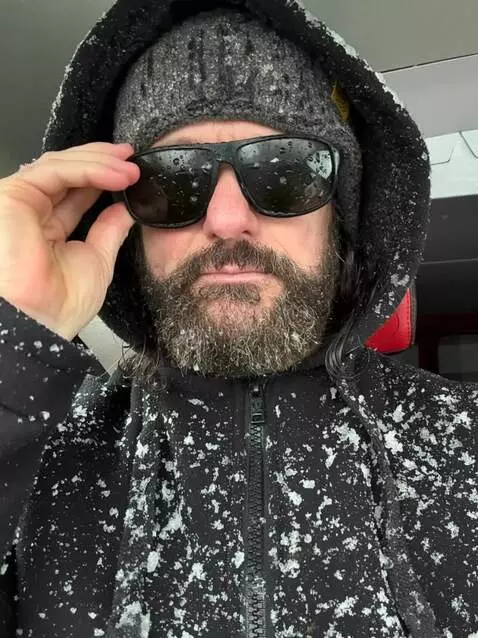 AI Video from prompt: Removes glasses and reveals robotic eyes like Th