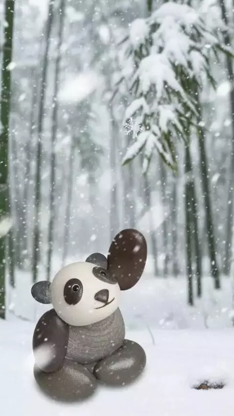 AI Video from prompt: Panda made from pebbles look up smile and try to