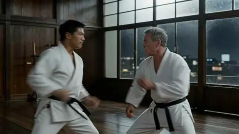 AI Video from prompt: A dynamic scene: two karate masters engage in a 