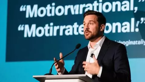 AI Video from prompt: Create a video a gentleman speaking below motiva