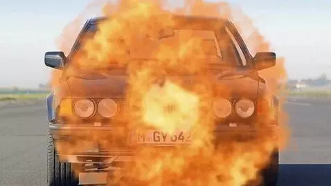 AI Video from prompt: The car explodes and bursts into flames