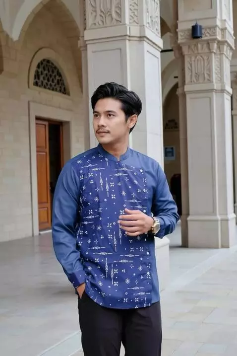 AI Video from prompt: This man stroked the shirt gently as if he was t