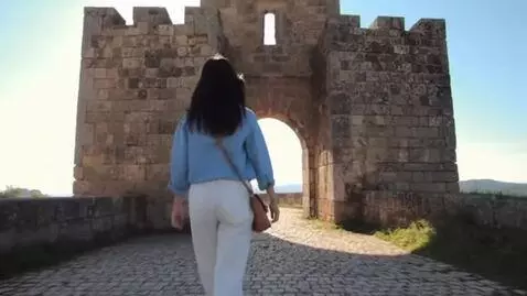 AI Video from prompt: Beautiful woman with blue shirt and white pants 