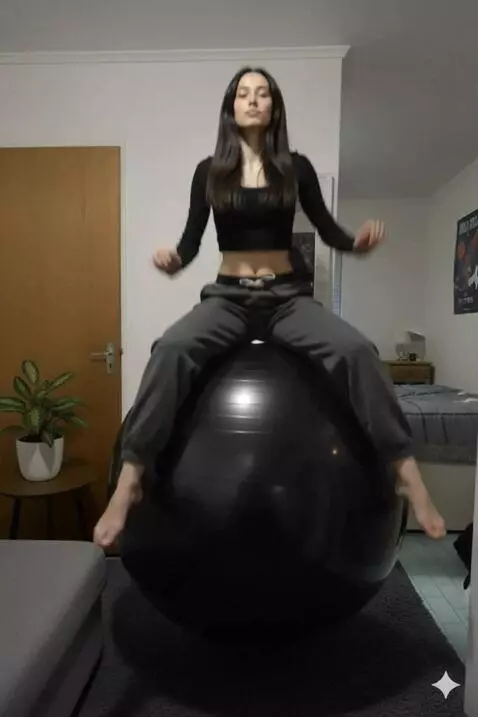 AI Video from prompt: A girl jumps on a black fitball