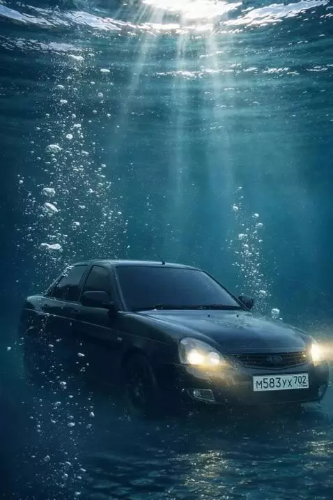 AI Video from prompt: A black Lada Priora fully submerged underwater. 