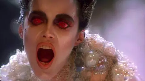 AI Video from prompt: Looking at viewer mouth wide open shaking head s