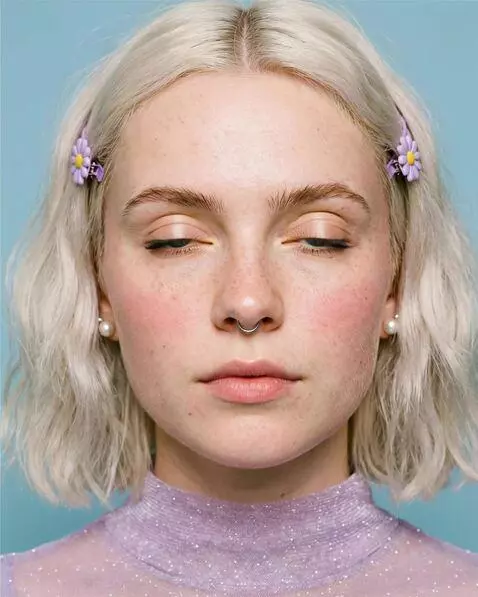 AI Video from prompt: Cinematic slow zoom into piercing blue wide-set 