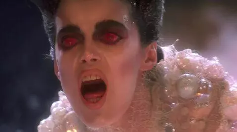 AI Video from prompt: Looking at viewer mouth wide open shaking head s