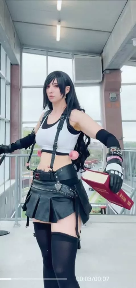 AI Video from prompt: hyper breast expansion. books bigger than body