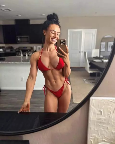 AI Video from prompt: She has an athletic build with beautiful, smooth