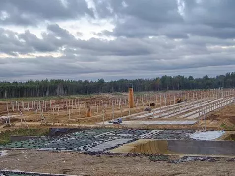 AI Video from prompt: An overcast day at the construction site is repl
