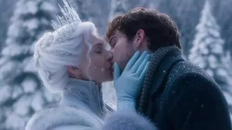 AI Video from prompt: A sixty-year-old snow queen kisses a young man o