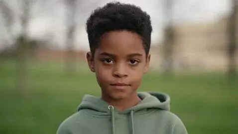 AI Video from prompt: Kid looking to camera 4 second and after looking