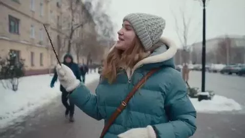 AI Video from prompt: A girl with hair in a jacket on a Russian street