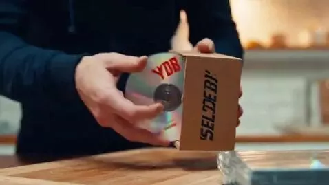 AI Video from prompt: A message arrives on the guy's phone.   In the m