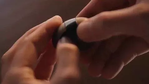 AI Video from prompt: Hyper realistic ASMR video of hands slowly apply