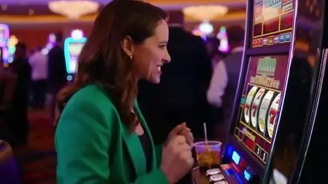AI Video from prompt: Lady luck wins big in the crowded casino