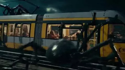 AI Video from prompt: the tram is on its way, and many giant spiders a
