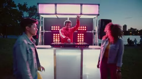 AI Video from prompt: A lively DJ plays 80s dance music at a mobile di