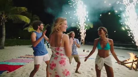 AI Video from prompt: A group of friends dances and celebrates at a vi