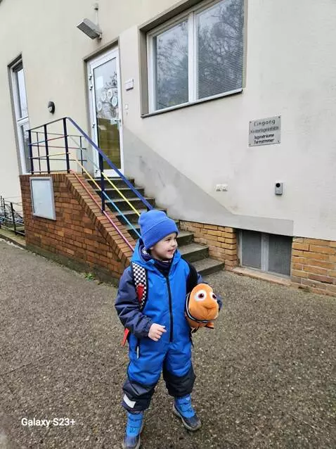 AI Video from prompt: Aleksandre plays with a fish