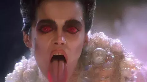 AI Video from prompt: Looking at viewer sucking lips sticking tongue o