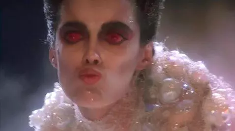 AI Video from prompt: Looking at viewer sucking lips sticking tongue o