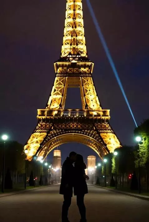AI Video from prompt: Two lovers embrace under the Eiffel tower, in th